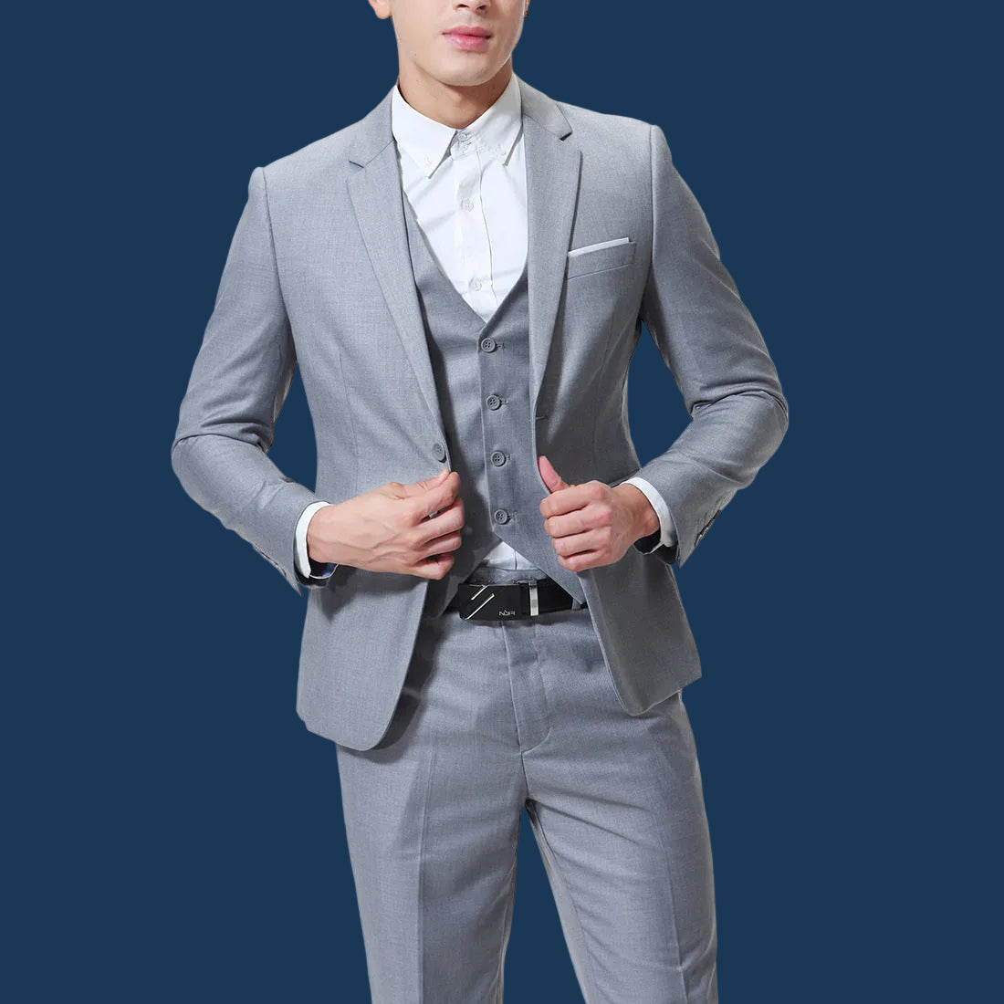 Gray suit with vest and white shirt on a white background
