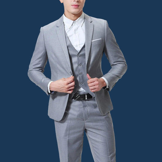 Gray suit with vest and white shirt on a white background