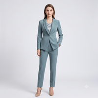 Woman wearing a light blue suit on a white background
