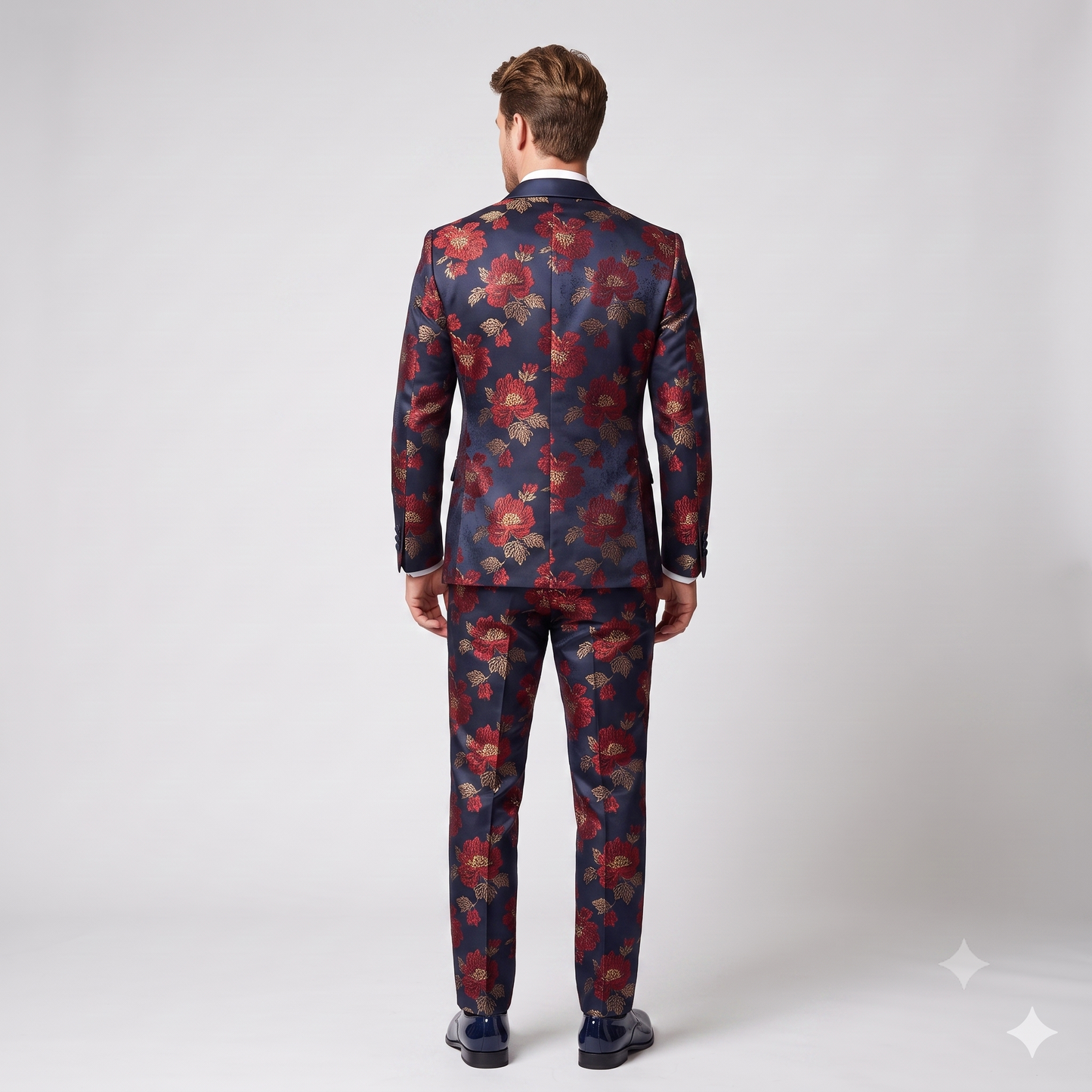 Man wearing a floral suit on a white background