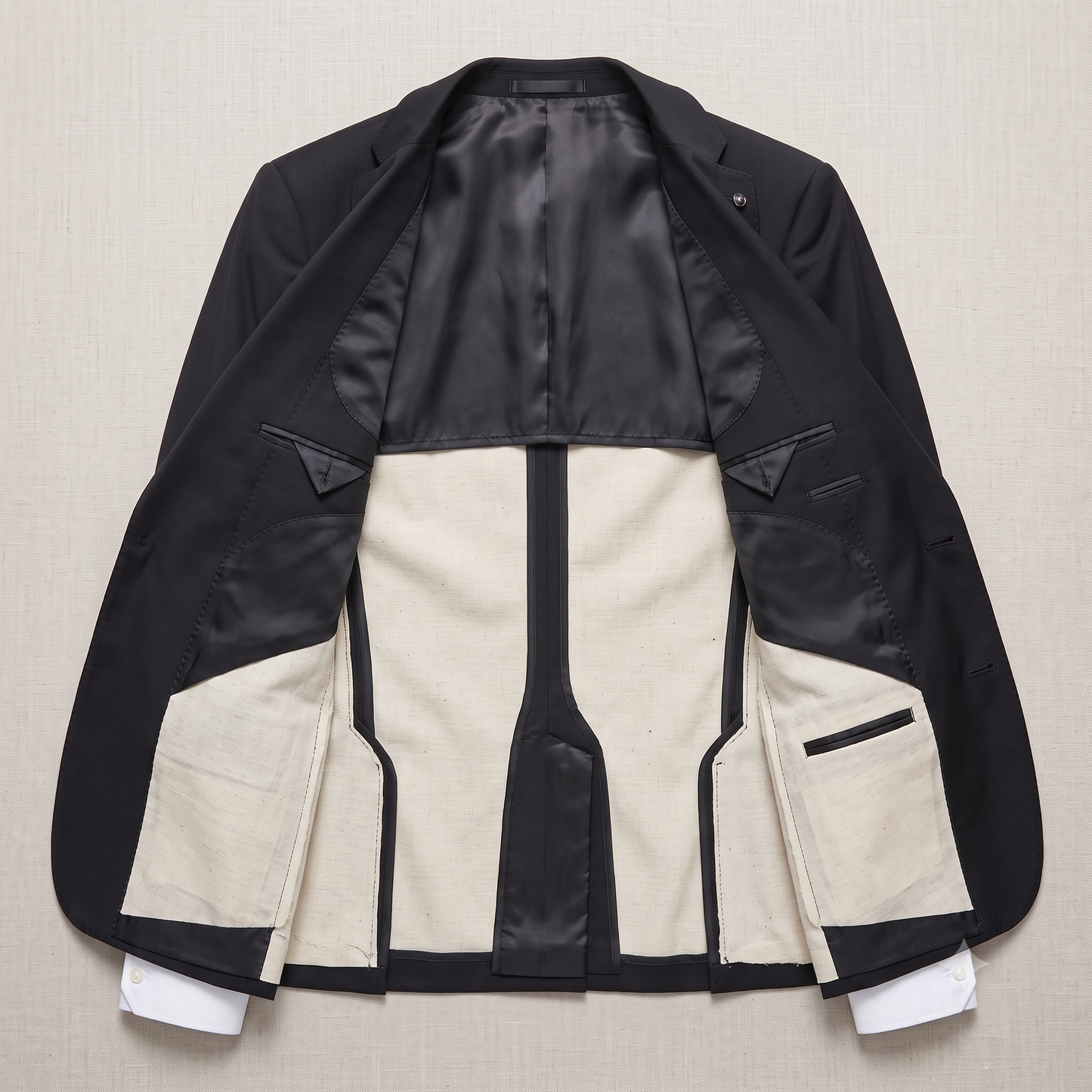 Black and beige jacket on a beige background