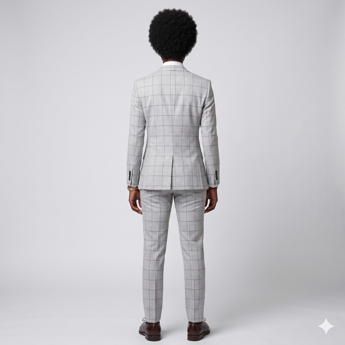 Person wearing a gray checkered suit on a white background