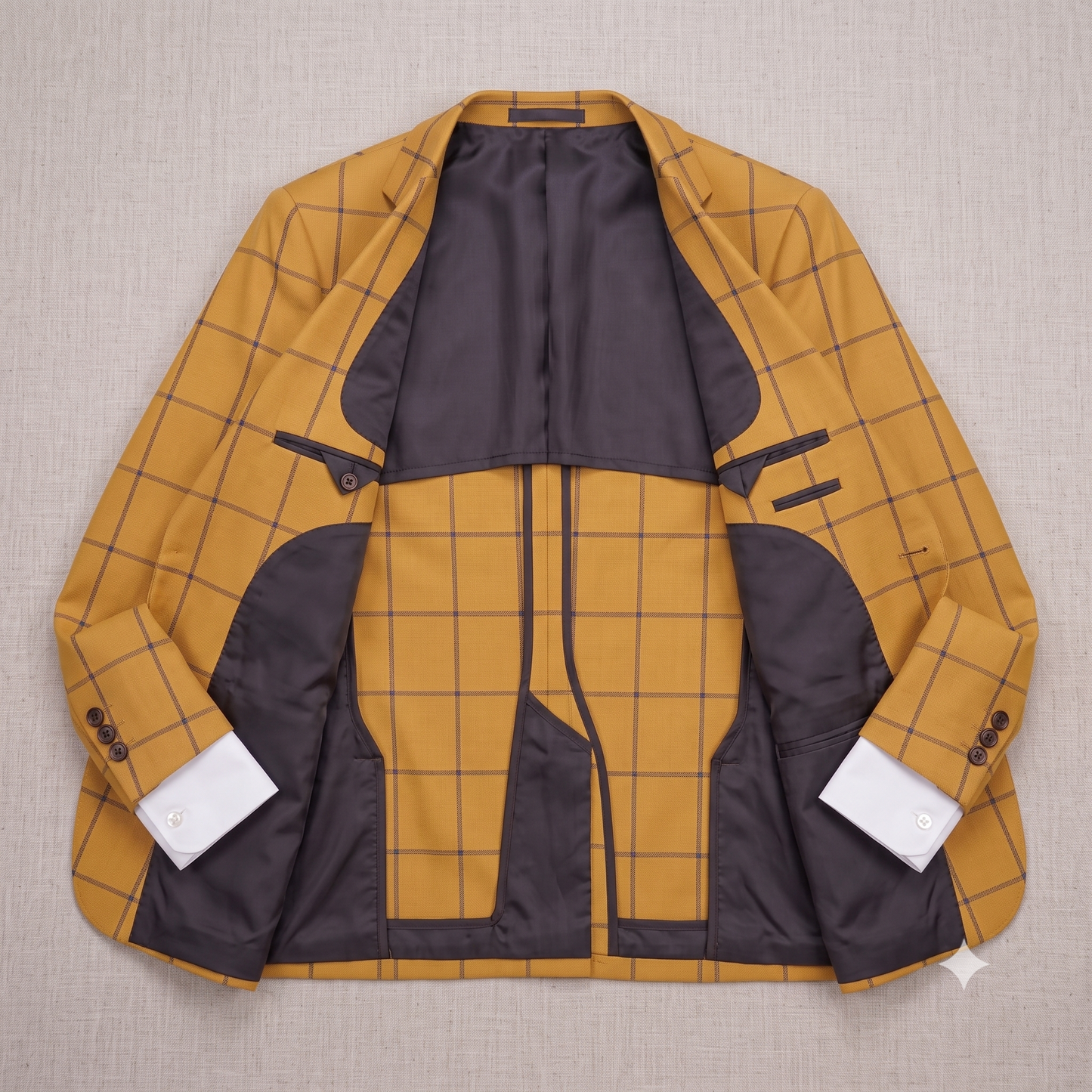 Yellow and black checkered jacket on a beige background
