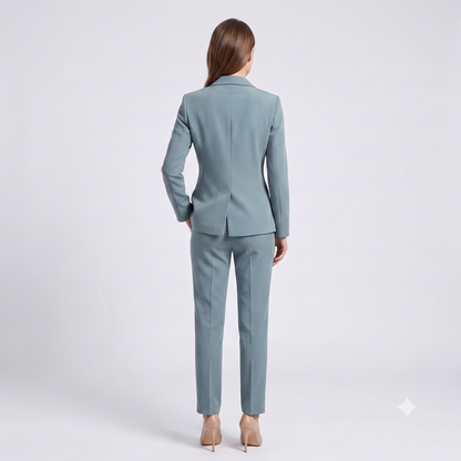 Woman wearing a light blue suit on a white background