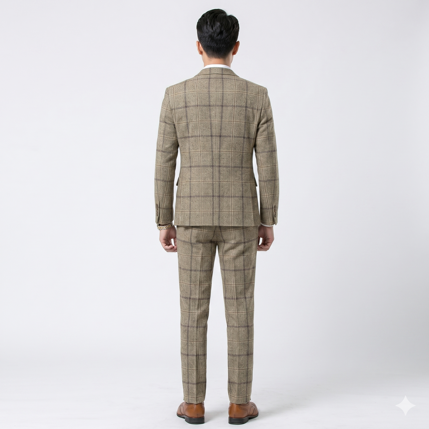 Man wearing a checkered suit on a white background